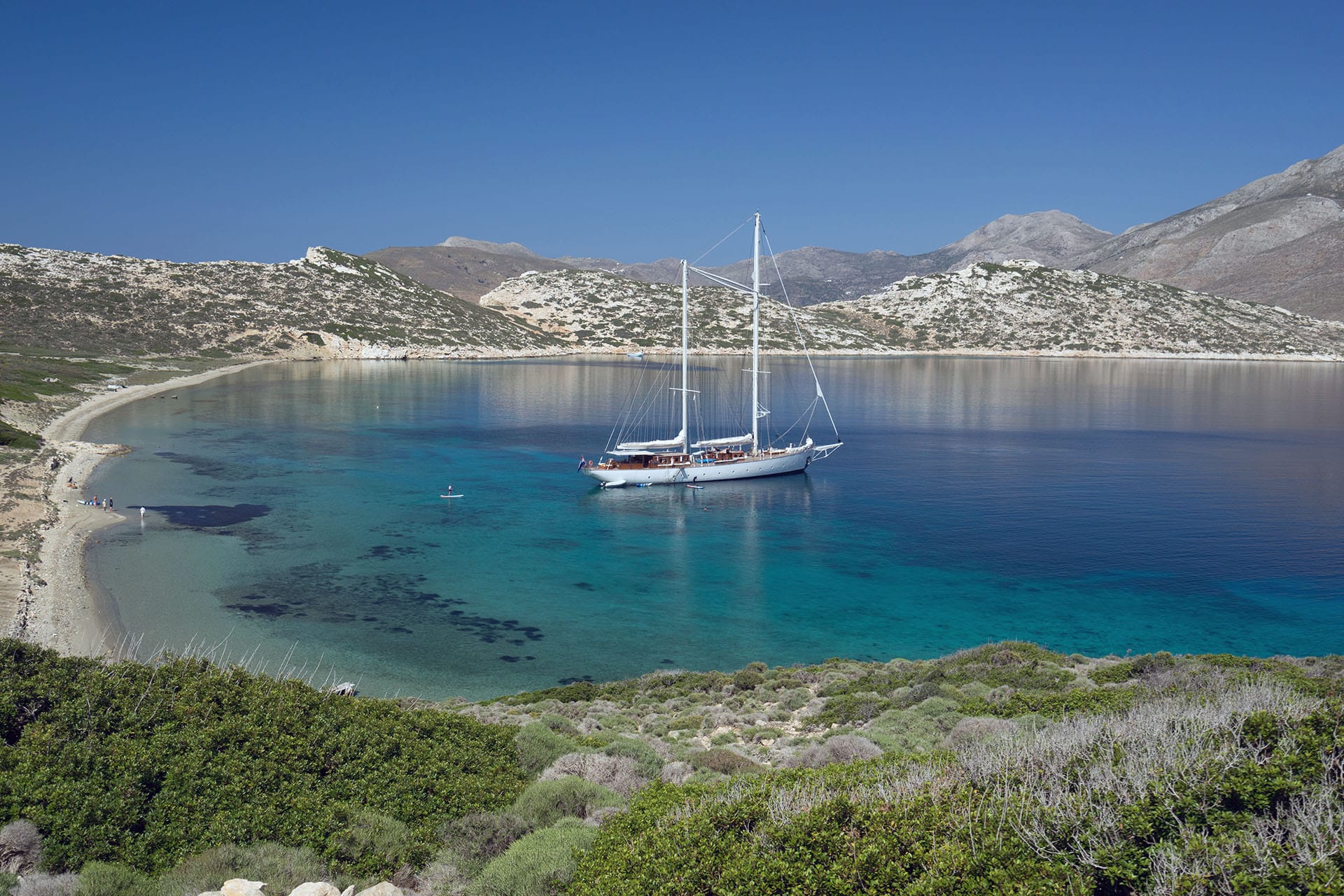 Rhea classic yacht anchored in the Cyclades, Greece, Mediterranean