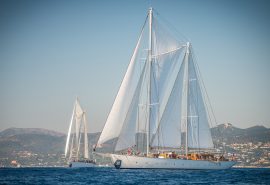 Rhea sailing in the Med with Chronos in the background