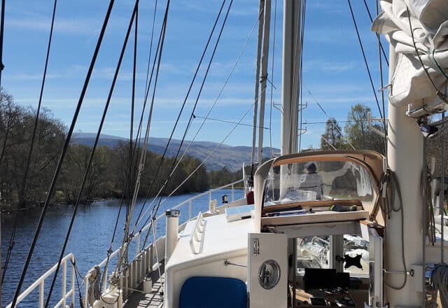 STEADY VIEW ON DECK WHILST SAILING THROUGH THE CALEDONIAN CANAL, SCOTLAND, Highlands