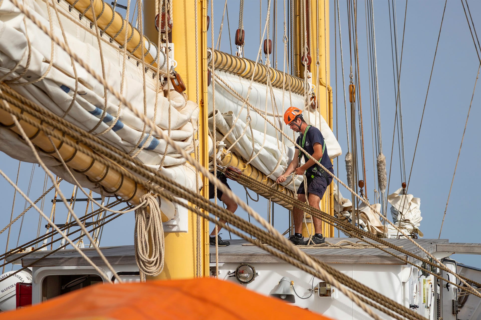 Santa Maria Manuela Crew onboard tying sails