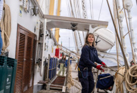 Santa Maria Manuela Female guest onboard pulling ropes underway