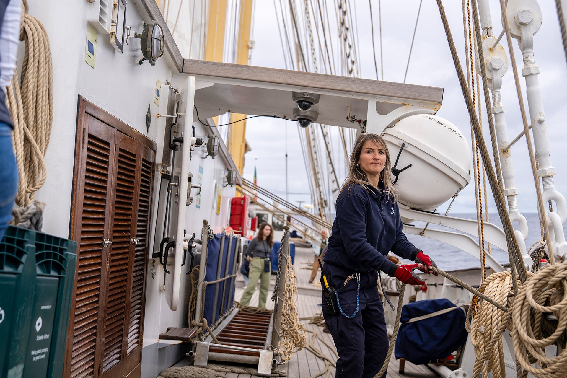 Santa Maria Manuela Female guest onboard pulling ropes underway