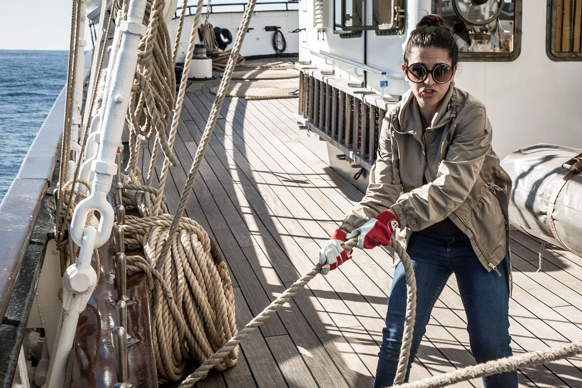 Santa Maria Manuela guest onboard pulling ropes