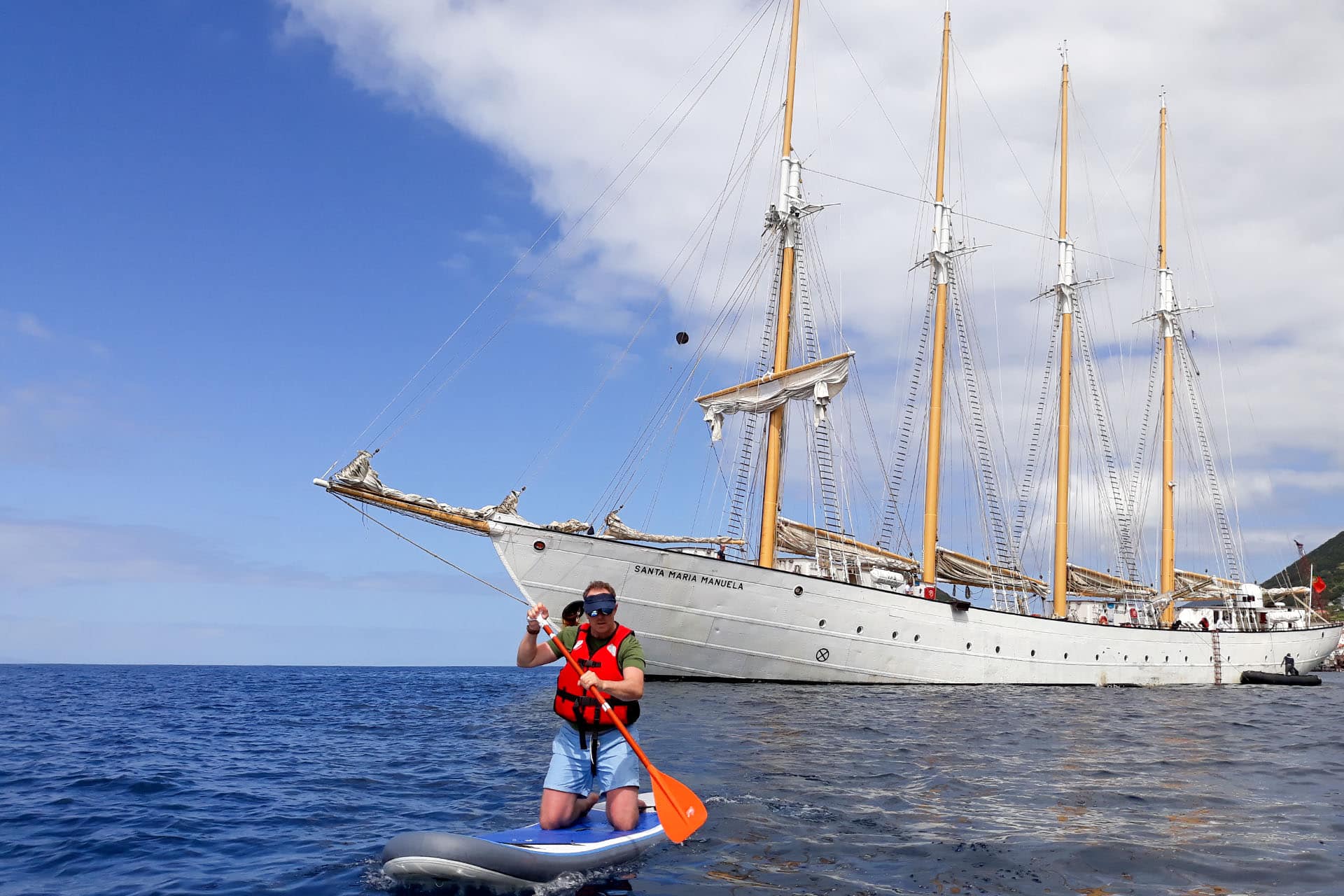 Santa Maria Manuela guest paddleboarding tall ship