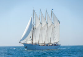 Santa Maria Manuela in full sail blue sky