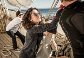 Santa maria manuela guests onboard pulling ropes tall ship