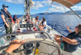 Sea Dragon guests on board relaxing in sunshine destination