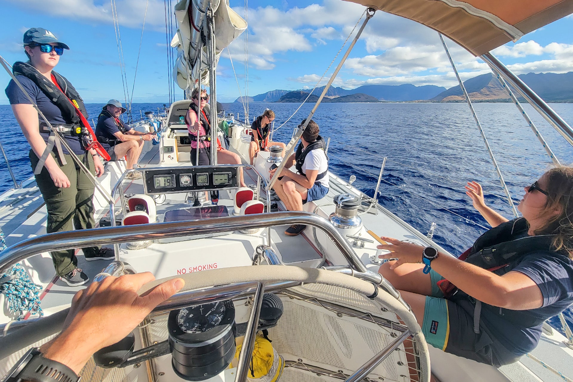 Sea Dragon guests on board relaxing in sunshine destination