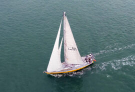 Sea Dragon sailing yacht underway full sail from above