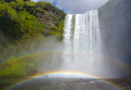 Sea Dragon view ashore of Skógafoss, waterfall, Iceland