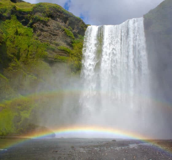Sea Dragon view ashore of Skógafoss, waterfall, Iceland