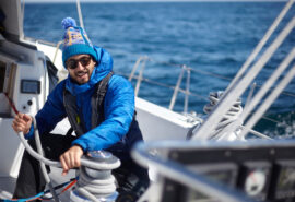 Sea dragon guest onboard tying sails underway adventure crossing