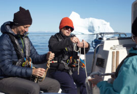 Sea dragon guests on deck learning knots in Arctic, greenland