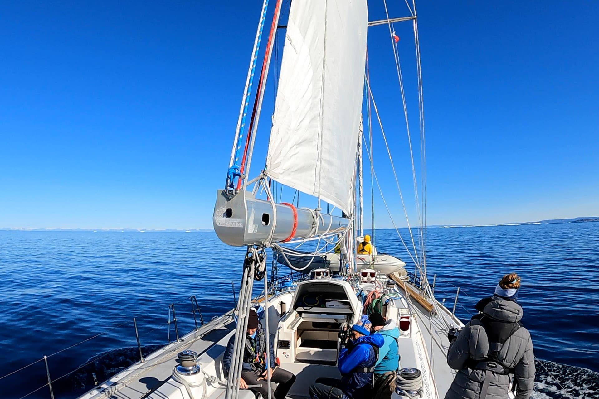 Sea dragon sailing under way on deck in sunny waters crossing