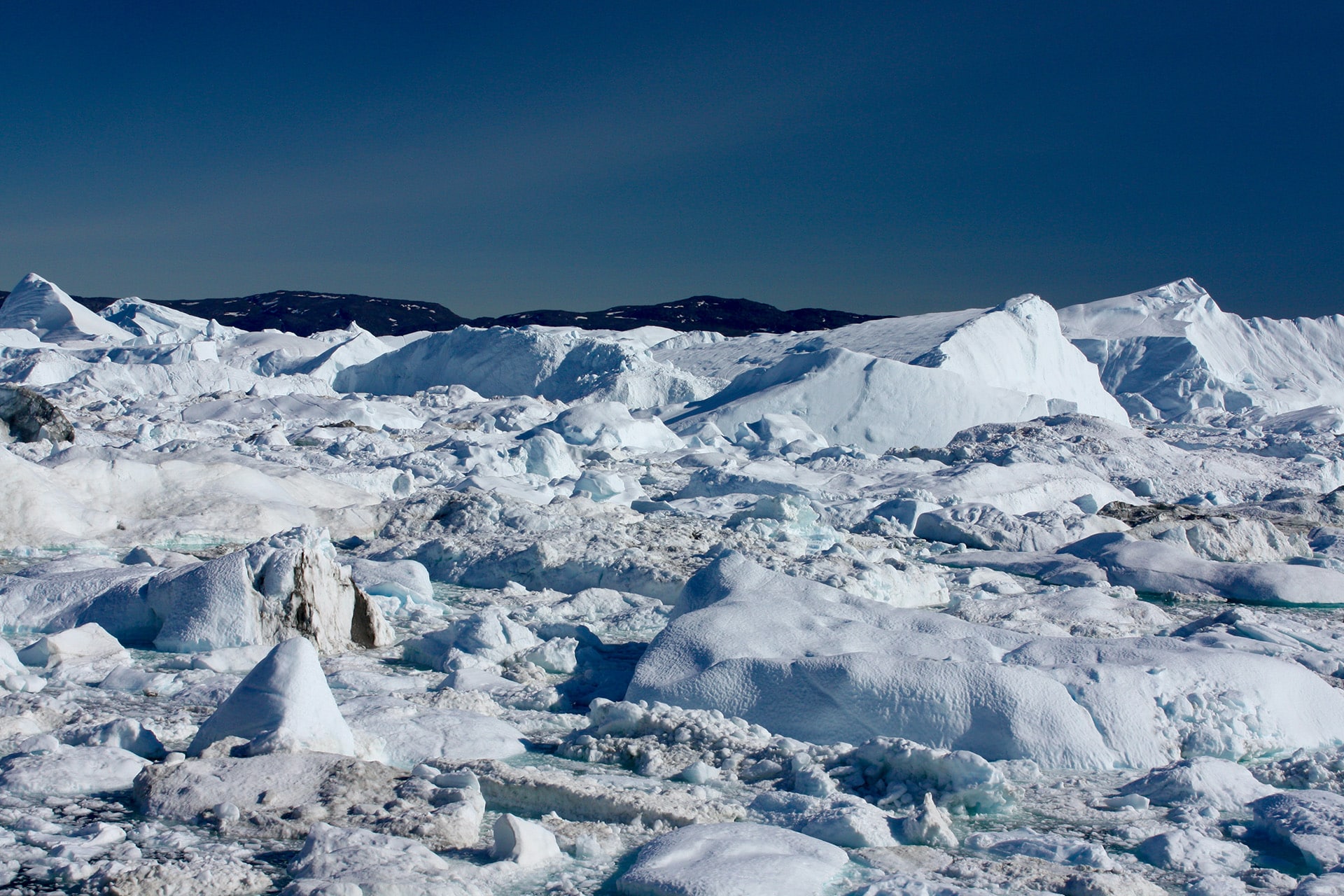 Sea dragon view of ice field in Ilulissat Icefjord, Greenland, Arctic