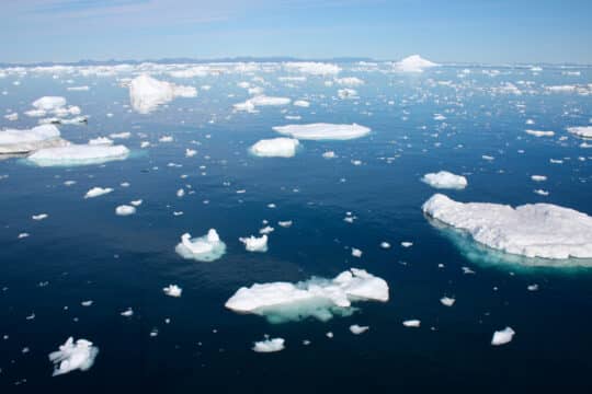 Sea dragon view of icy waters in Ilulissat Icefjord, Greenland, Arctic