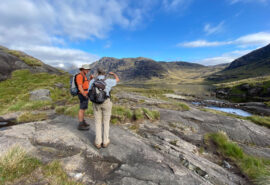 Steady guests hiking ashore Loch Coruisk, Isle of Skye, walking Scotland