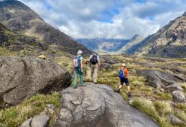 Steady guests walking ashore Isle of Skye, Hebrides hiking Scotland