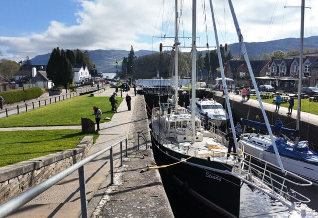 Steady moving through lochs in the Caledonian Canal, Scotland, Highlands