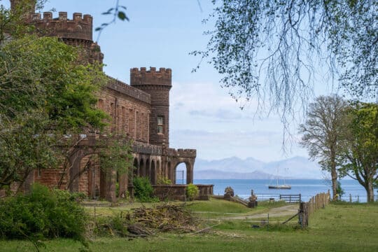 Steady yacht anchored at Kinloch Castle, Isle of Rum, Hebrides, Scotland