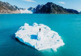 Svalbard valiente guest standing on floating Arctic ice
