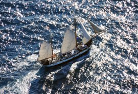 Tecla under full sail open ocean