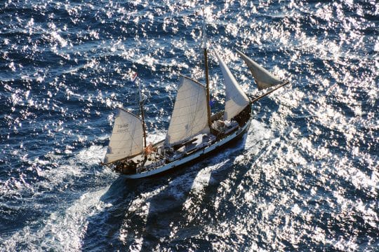 Tecla under full sail open ocean