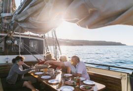 Twister guests dining onboard breakfast lunch on deck interior