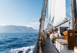 Twister schooner underway sailing view of Caribbean islands
