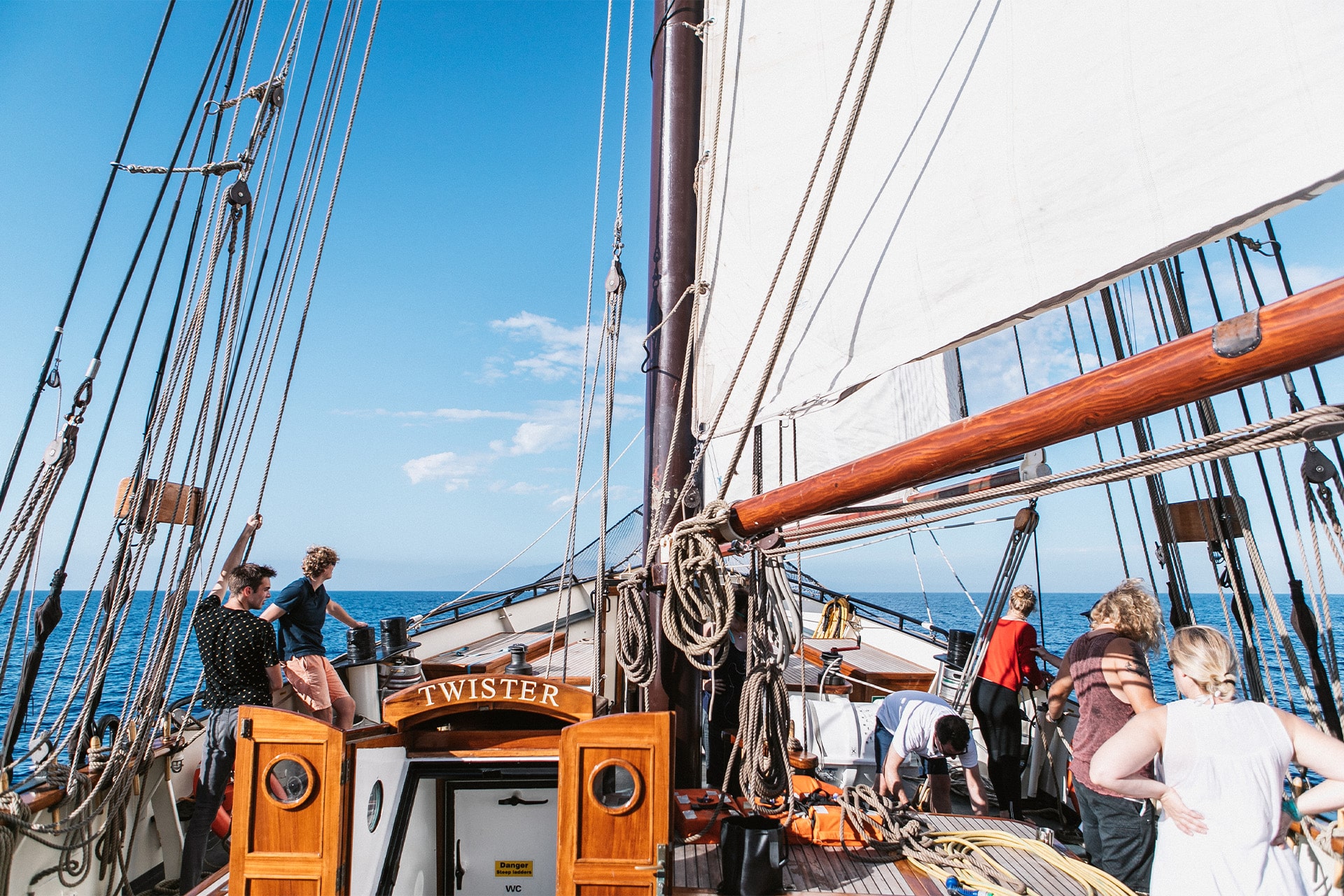 Title Twister view on deck of schooner underway sailing with guests Caption