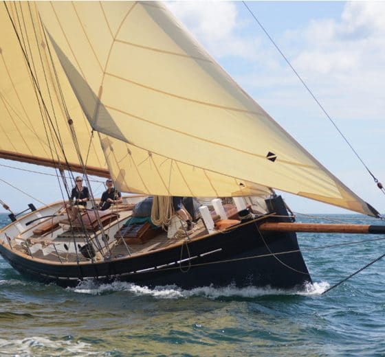 Unity cutter boat under sail