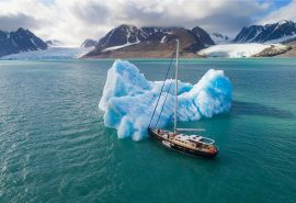 Valiente anchored iceberg in Arctic Svalbard
