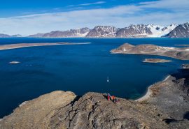 Valiente anchored with guests ashore Arctic summer Svalbard