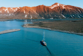 Valiente sailing in polar summer Arctic Svalbard