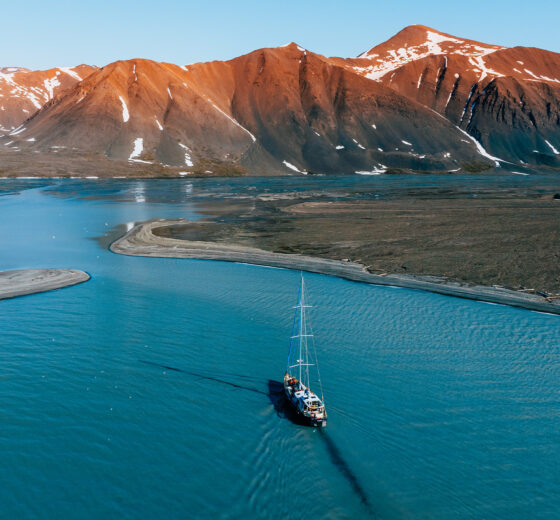 Valiente sailing in polar summer Arctic Svalbard