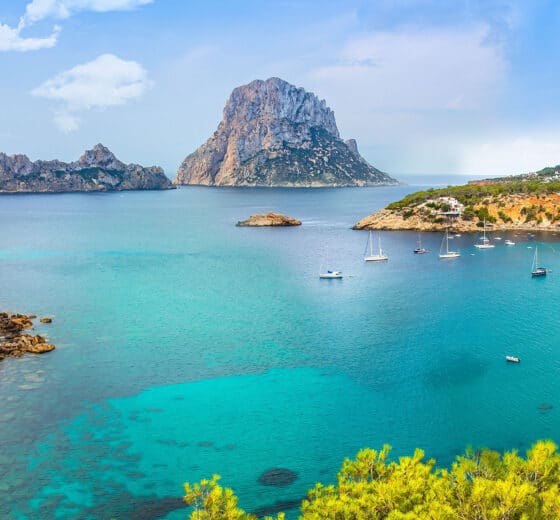 View of coast in Ibiza, Spain yachts anchored