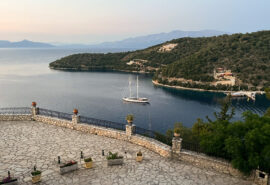 Yacht Kairos anchored in bay in Corfu, Ionian Sea, Greece