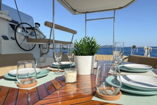 Zorba Catamaran exterior dining table area closeup
