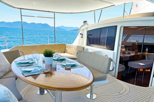 Zorba catamaran deck dining area exterior