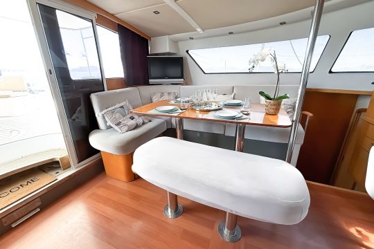 Zorba catamaran interior saloon dining seating area