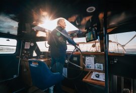 Zuza crew sailing from wheelhouse onboard]