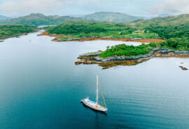 Zuza expedition yacht anchored off islands of the Scottish Hebrides, Scotland