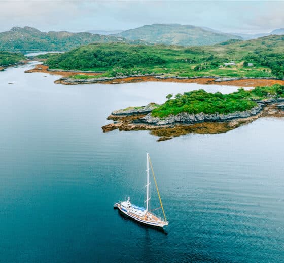 Zuza expedition yacht anchored off islands of the Scottish Hebrides, Scotland