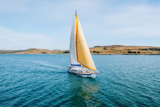 Zuza expedition yacht in full sail, Hebrides, Scotland