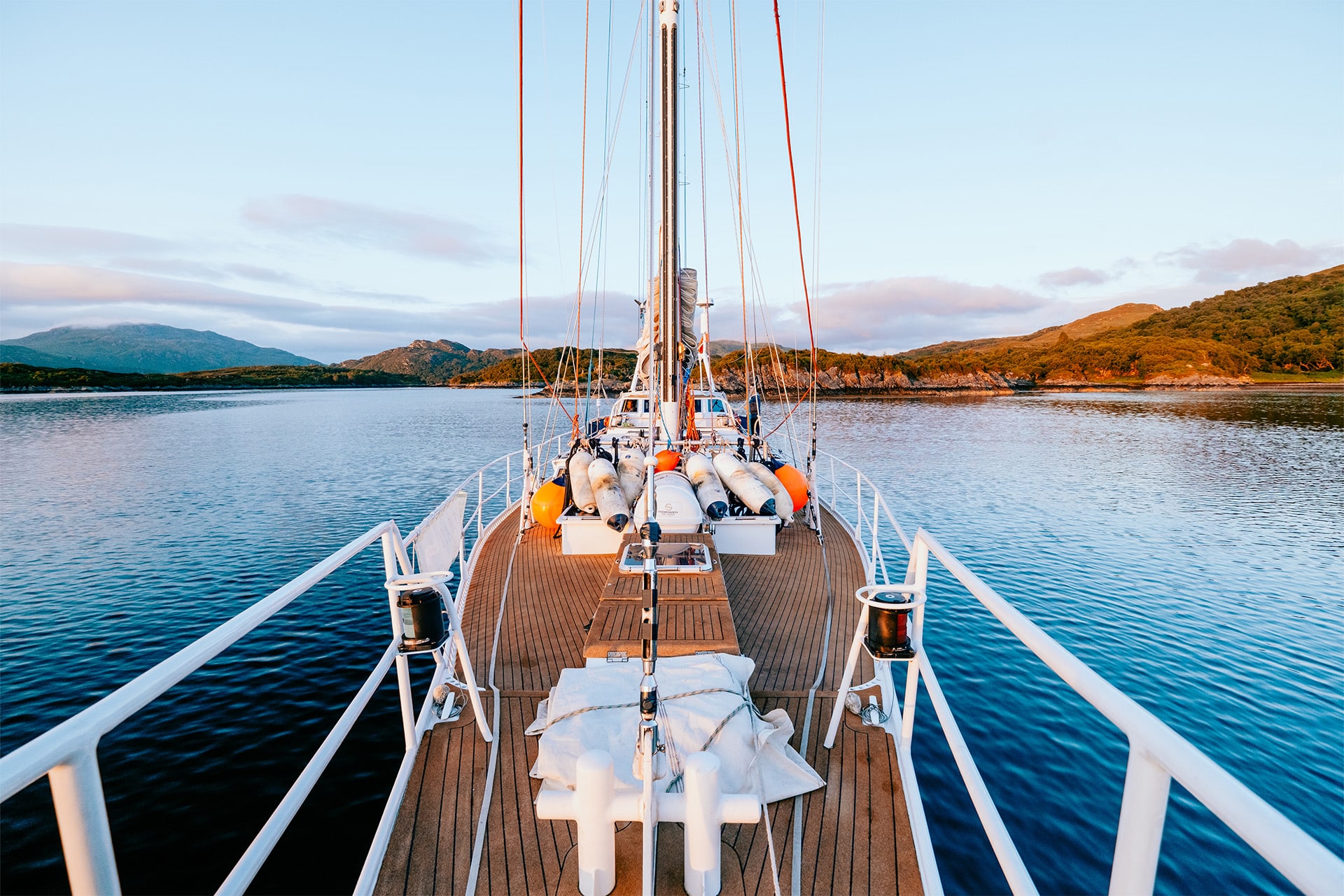 Zuza expedition yacht on deck sailing in the Scottish Hebrides, Scotland