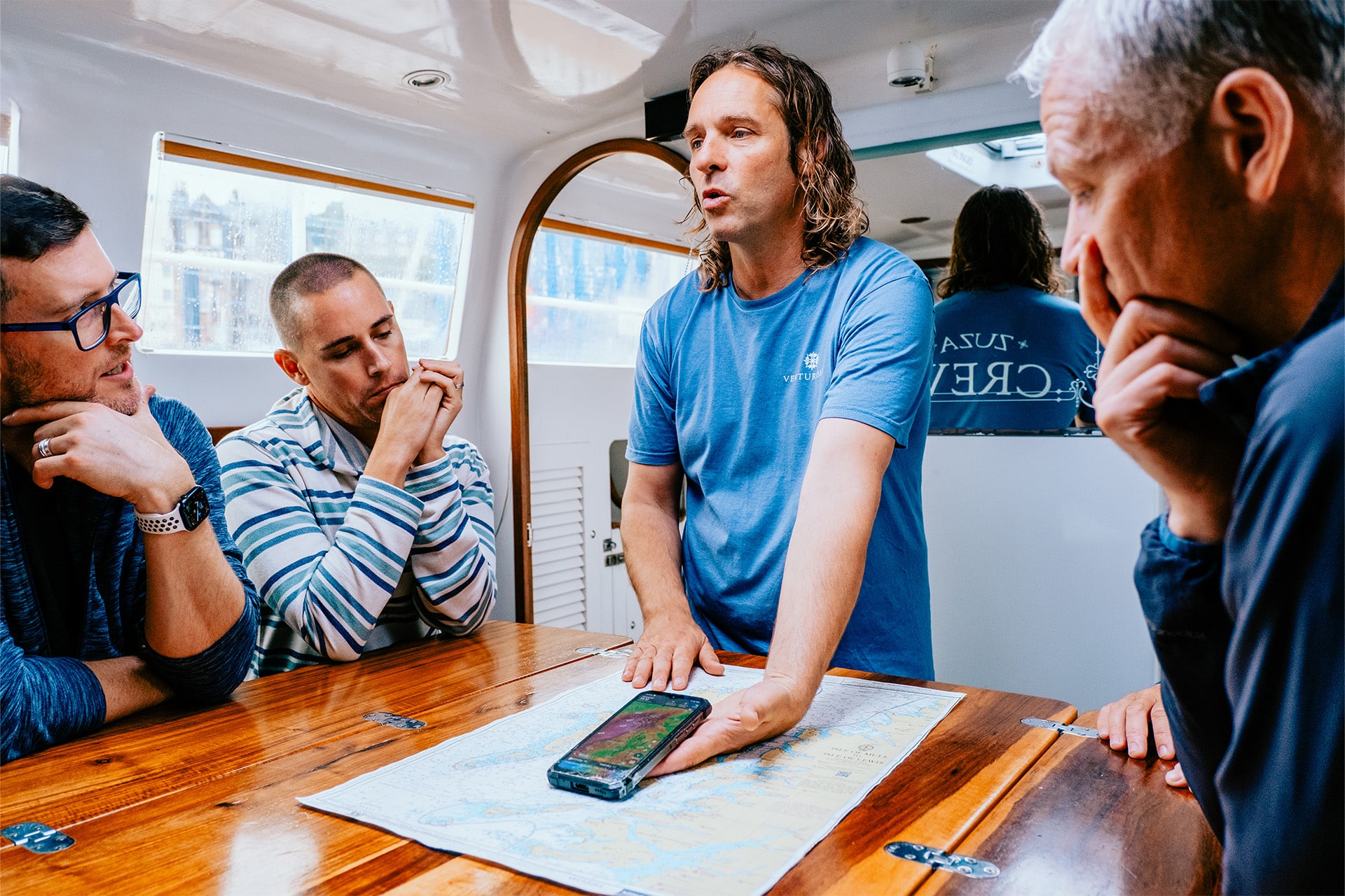 Zuza expedition yacht onboard guests navigation with crew