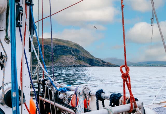 Zuza expedition yacht onboard view on deck sailing in the Hebrides Scotland
