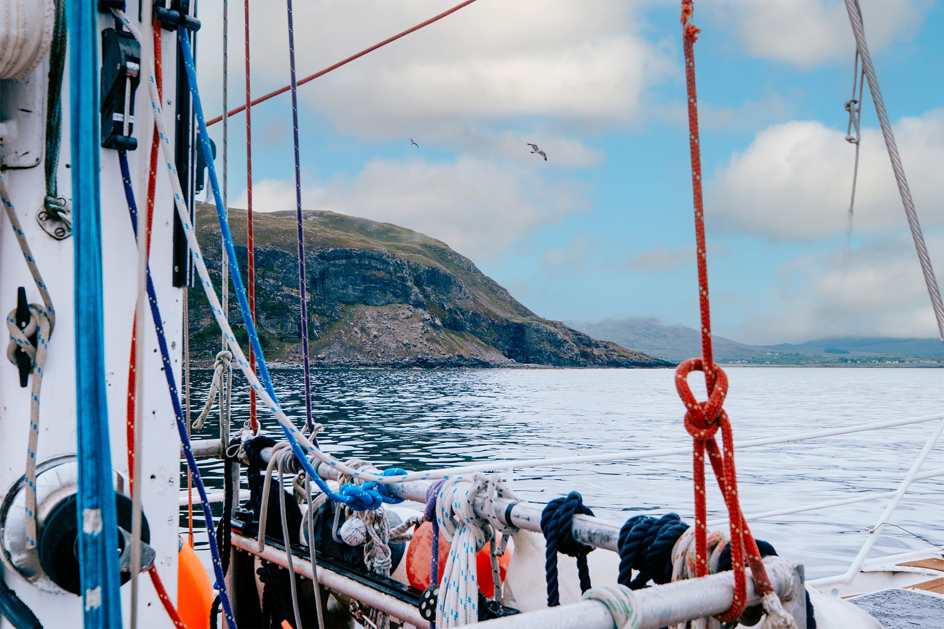 Zuza expedition yacht onboard view on deck sailing in the Hebrides Scotland
