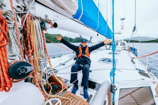 Zuza happy female solo sailor on deck life on board sailing Scotland