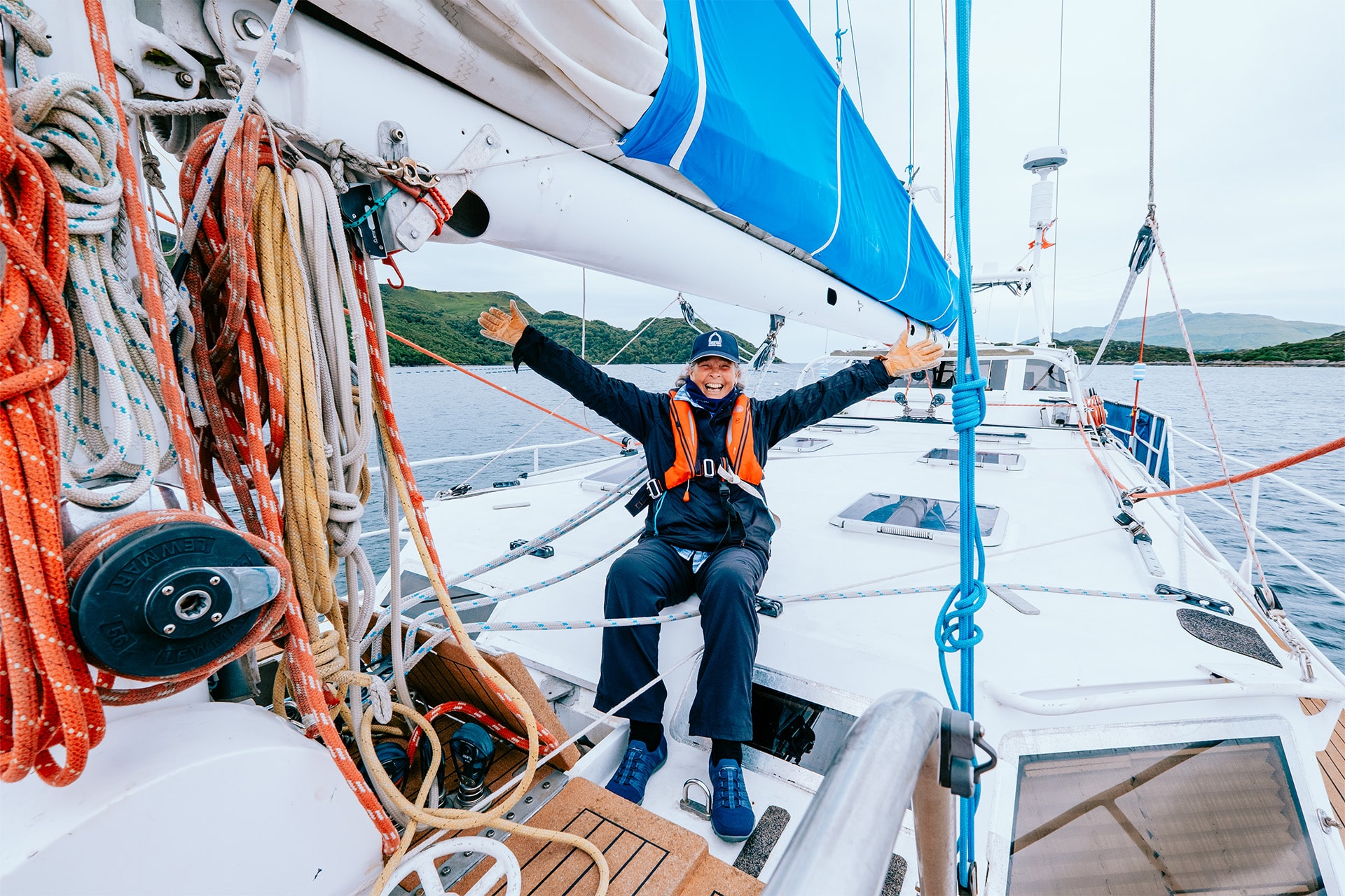 Zuza happy female solo sailor on deck life on board sailing Scotland